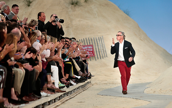 Tommy Hilfiger gallery: Hilfiger blows kisses as he reacts to applause following the show for his S