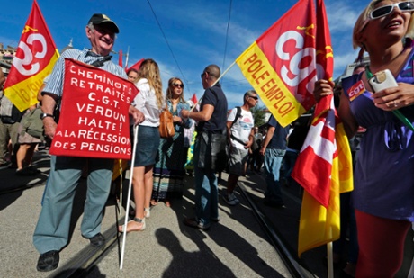 Pierrot Blairet (L), a 83 years old retired man of the French railway company SNCF, takes part in a nationwide demonstration against the pension reform in Nice September 10, 2013.