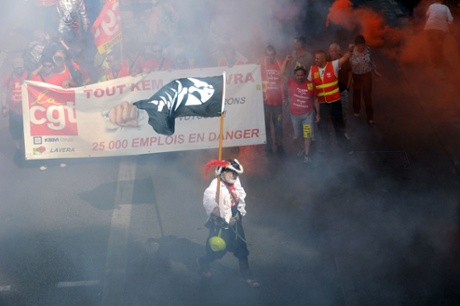 People march as part of a nationwide day of protest against the government's plans to reform France's debt-ridden pension system, on September 10, 2013 in Marseille, southern France.