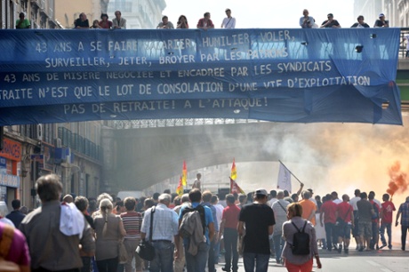 People march as part of a nationwide day of protest against the government's plans to reform France's debt-ridden pension system, on September 10, 2013 in Marseille, southern France.
