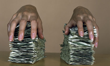 piles of money hands