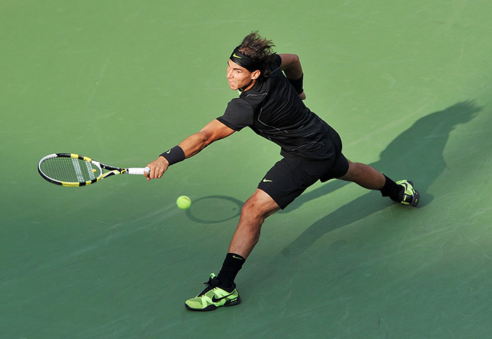 Nadal's trophies: 17 Rafael Nadal of Spain returns a shot