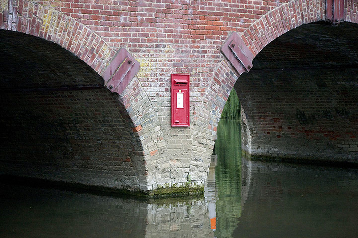Lighter Look: Post box appears on a bridge 