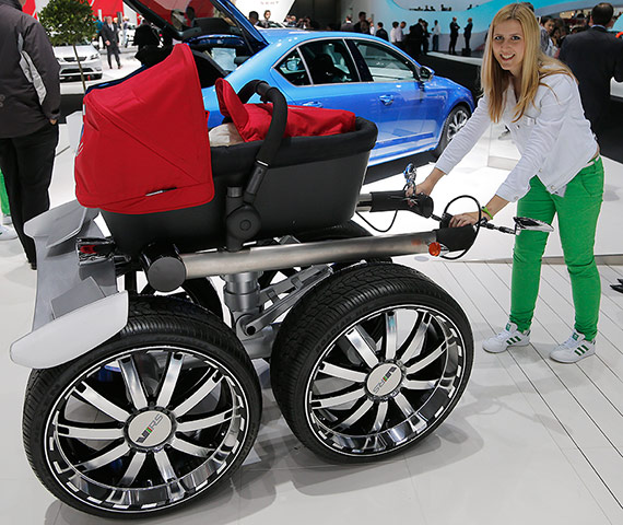 Lighter Look: A baby carriage with car wheels
