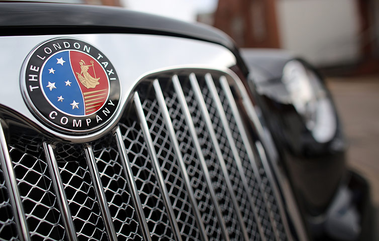 London cab company: Detail of the grille and insignia of a completed TX4 