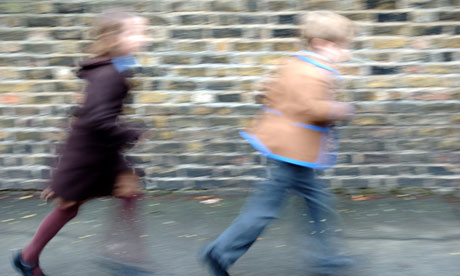 Primary school kids running 