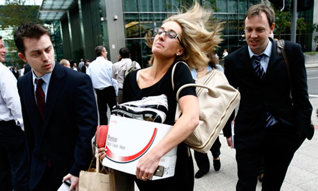Lehman Brothers employees carry their belongings out of its London office on the day the bank collap