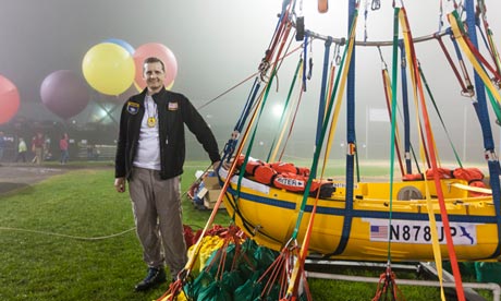 Jonathan Trappe with the boat attached to clusters of balloons, which he hoped would carry him acros