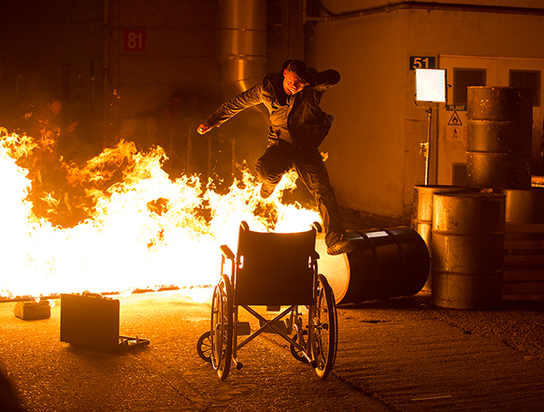 The Wrong Mans: Andrew Koji jumps through a wall of flames