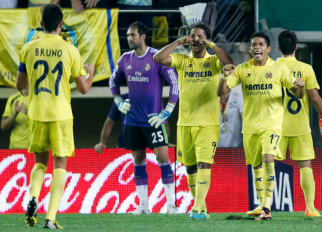 Bale's debut: Giovani Dos Santos celebrates