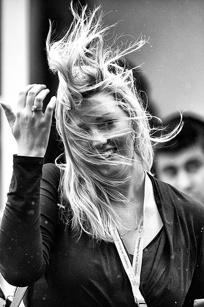 Lib Dem conference: Delegates shelter from the wind and rain as they arrive