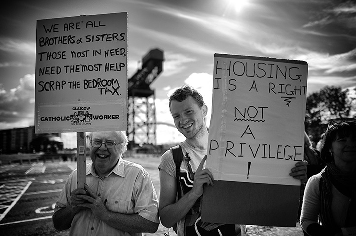 Lib Dem conference: Protesters gather outside the Scottish Exhibition and Conference Centre ahe