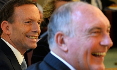 Australian Prime Minister-elect Tony Abbott and Warren Truss, National party leader, smile during their party meeting in Parliament House in Canberra. SAEED KHAN/AFP/Getty Images
