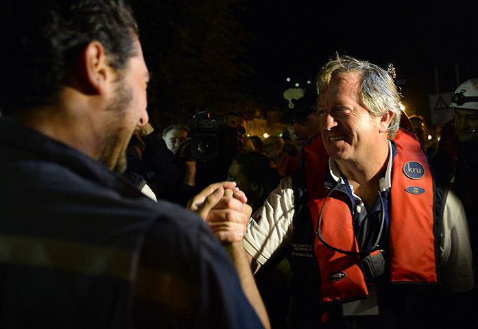 Concordia refloats: Nick Sloan, right, senior salvage master of Titan-Micoperi, smiles with wor