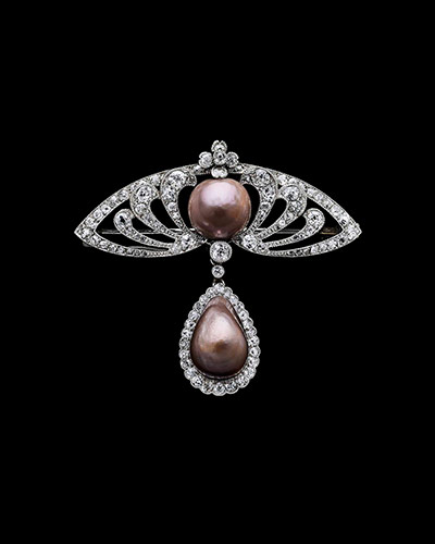 Pearls: Brooch, natural brown pearls set in platinum and diamonds