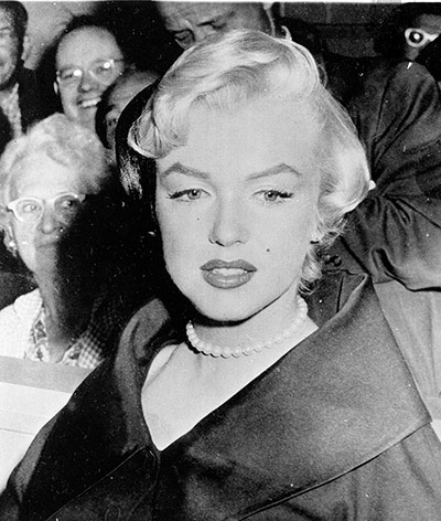 Pearls: Marilyn Monroe wearing a pearl necklace