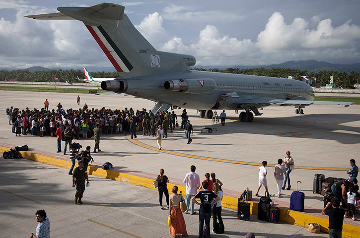 mexico floods: Tourists wait to be evacuated