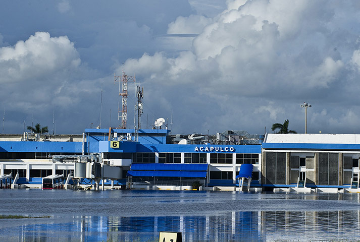 mexico floods: The flooded tarmac at Acapulco airport 