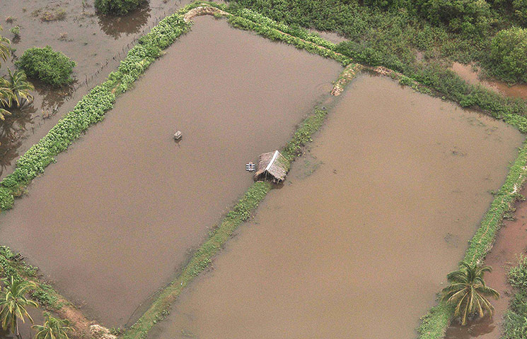 mexico floods: Aerial view of a flooded area after heavy rains in Acapulco