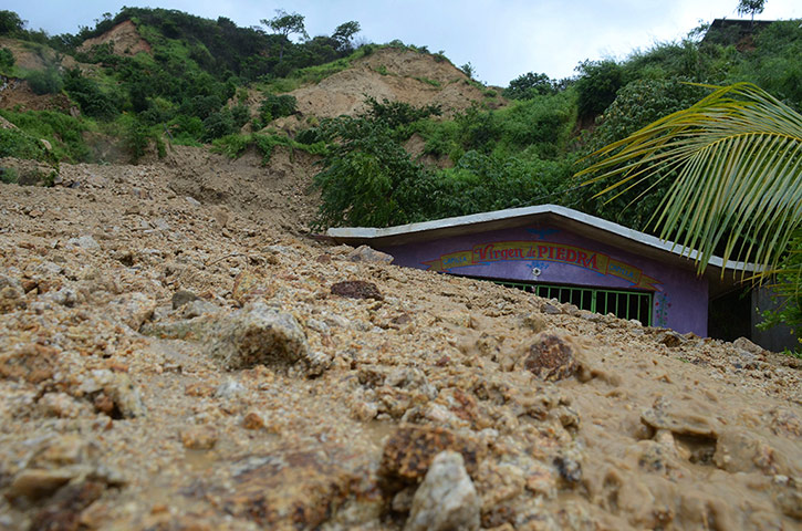 mexico floods: A small chapel is engulfed in rock and mud from a landslide 