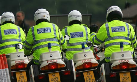 Policemen patrol in Gleneagles 05 July 2