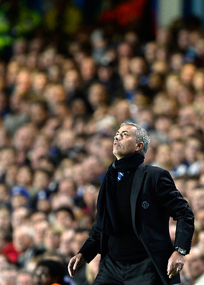 Chelsea -: Chelsea's manager Mourinho watches the ball
