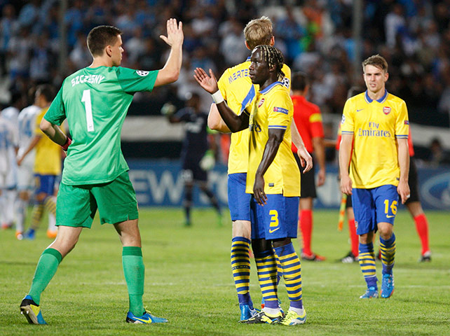 Arsenal_: Arsenal's Szczesny and Sagna celebrate