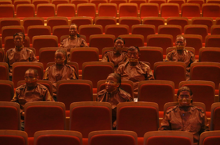 FTA: Jason Lee: Artist Liu Bolin (3rd row, right) sits with other participants