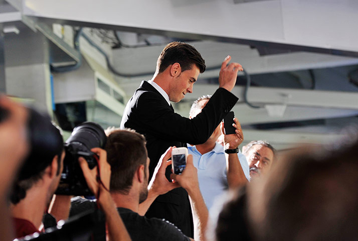 Bale arrives in Madrid: Gareth Bale acknowledges the adulation