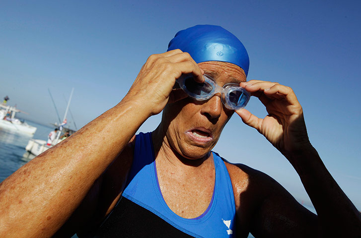 Swimmer Diane Nyad: Swimmer Diana Nyad adjusts her goggles