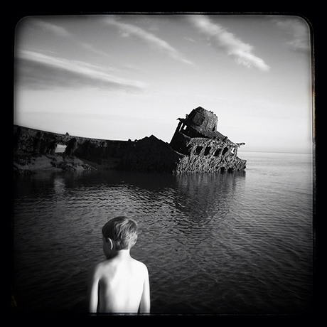 Your Pics - Mysterious: black and white photo of boy looking across river