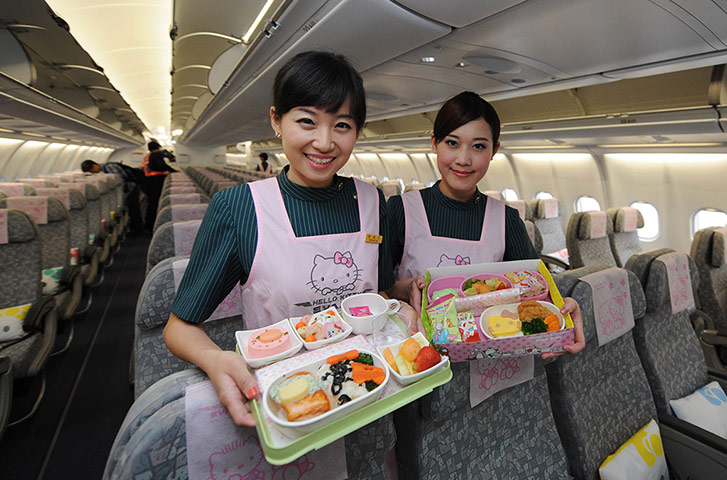 Hello Kitty plane: Flight attandants with the Hello Kitty meals