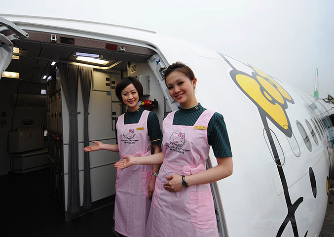 Hello Kitty plane: Flight attendants welcome you on board