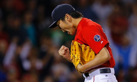 Boston Red Sox pitcher Koji Uehara reacts after getting the final out in the Red Sox win over the New York Yankees in their MLB American League baseball game at Fenway Park in Boston, Massachusetts September 13, 2013.  REUTERS/Brian Snyder  (UNITED STATES - Tags: SPORT BASEBALL) :rel:d:bm:GF2E99E06F101