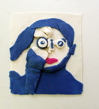 Play-doh photographs: The Photojournalist