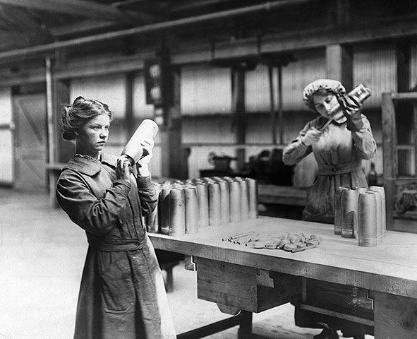 Women workers assembling artillery shells at a munitions factory
