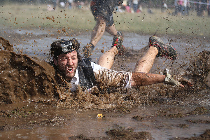 Weekend in pictures: A man competes in The Mud day challenge