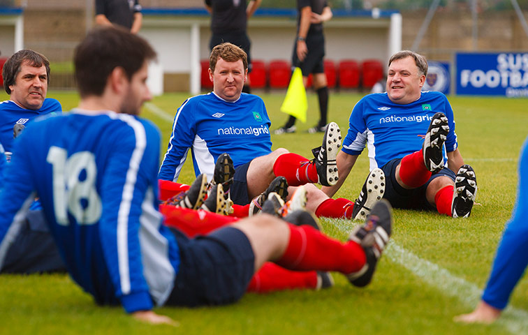 Labour football match: players warm up