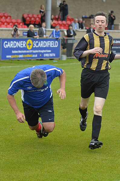 Labour football match: Ed Balls falls