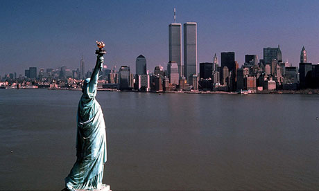 The Statue of Liberty, with the twin towers in the background: their destruction happens halfway thr