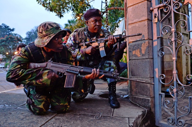 The sense of urgency in the eyes of the Kenyan soldier in the foreground is a clear indication of the danger they're in as gunfire breaks out around the shopping centre.