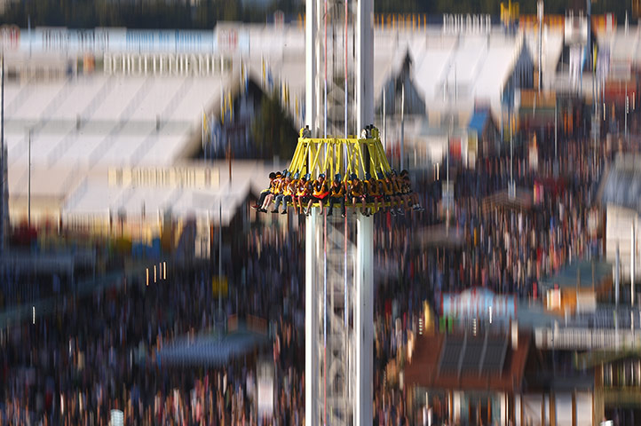 Oktoberfest: Visitors enjoy a fairground ride