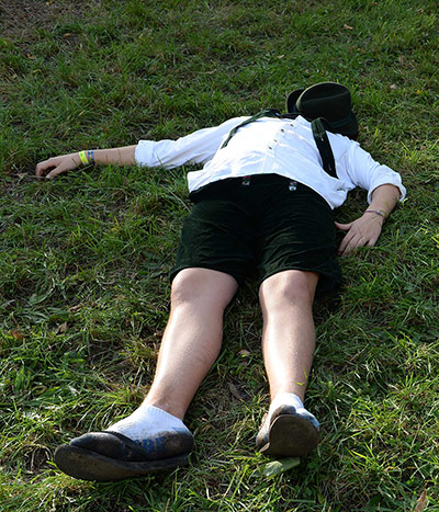 oktoberfest: A visitor lays on a meadow 
