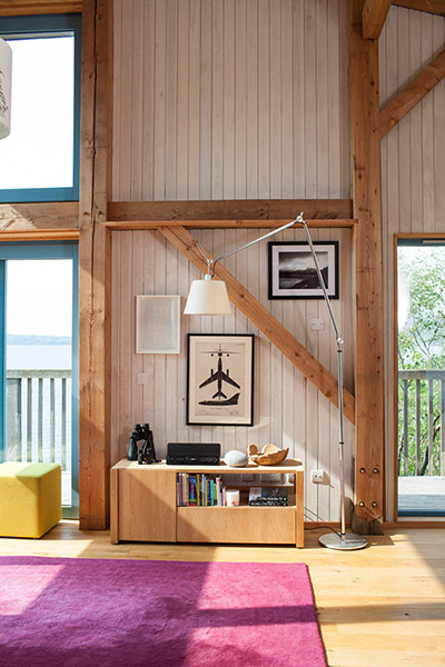 Homes - On The Rocks: living area with wooden beams