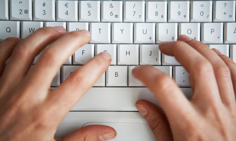 Hands Writing On A Computer Keyboard 