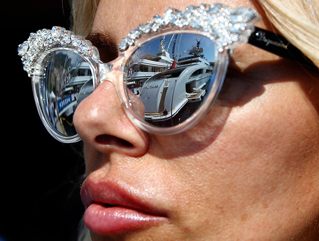 Yachts: Luxury boats are reflecting in a visitor's sunglasses 