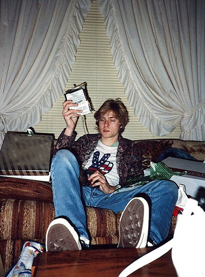 Cobain home: Kurt Cobain opens presents in his childhood home