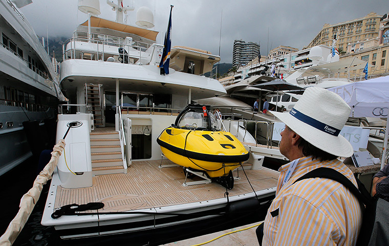 Yachts: A yacht with a submarine on the deck