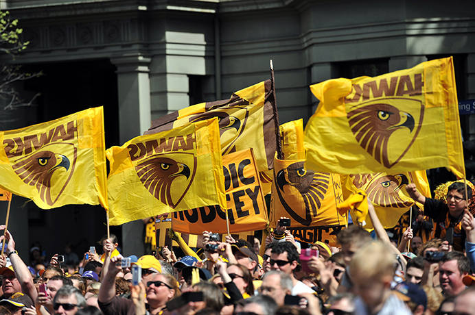 AFL Parade: Hawthorn fans fly flags