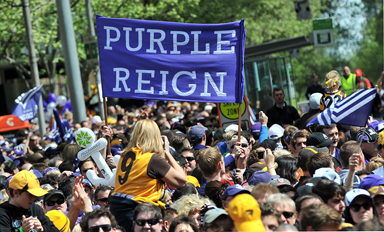 AFL Parade: Fremantle fans hold up a 'Purple Reign' sign